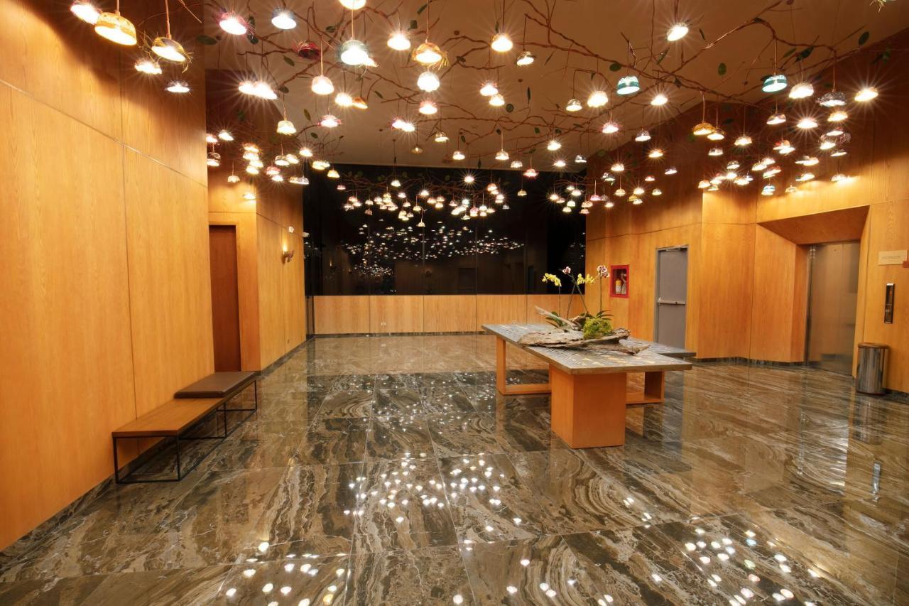 Hotel V1501 Pasto Eksteriør bilde The lobby of the National Museum of Singapore